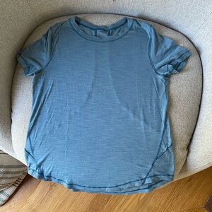 Teal Lululemon short sleeved shirt.  No size tag but it’s an 8.
